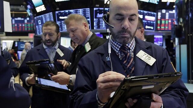 Stock futures edge down as energy prices climb